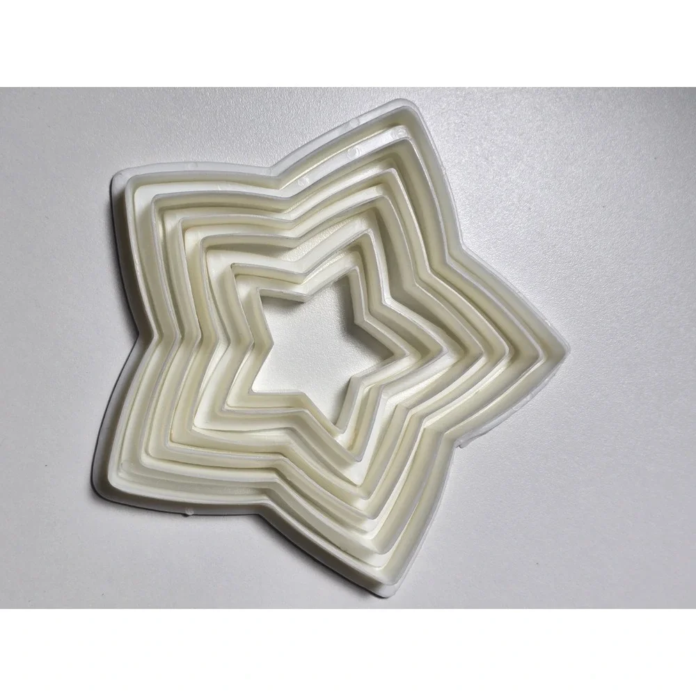Wilton White Nesting Stars Cookie Cutters 6 Piece Set Made in Hong Kong 2-5 Inch